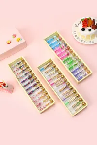 Detailed view of creative glass wish bottles gift set with cute miniature charms and lovely message.