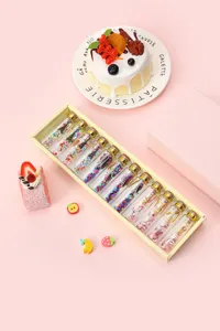Detailed view of wish bottles set with colorful confetti and cute Eiffel tower charms.