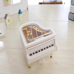 Mini piano music box detail view, creative desktop decor and jewelry storage gift item.