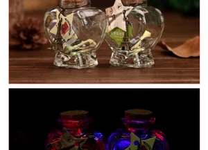Creative heart shaped glass wishing bottle with cork stopper and Eiffel tower charm for gift.