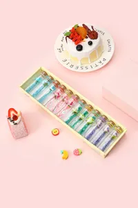 Creative glass drift wishing bottle set with colorful sand, flowers, and elegant gift box.