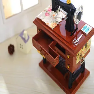Vintage sewing machine music box with drawer, retro home decor and creative birthday gift.