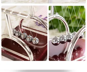 Newton cradle balance balls T-shaped metal physics toy desktop science decor detail view