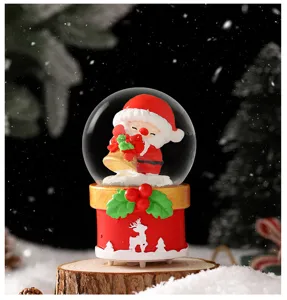 Christmas snow globe ornament with glowing Santa Claus design for desktop holiday decor and gifts.