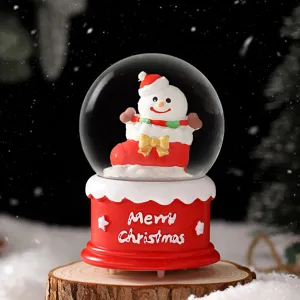 Christmas glowing snow globe with cute snowman figure, perfect festive holiday gift.