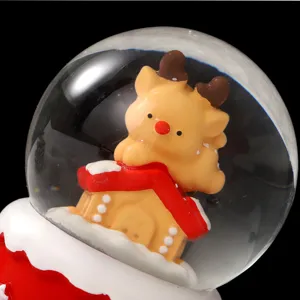 Christmas glowing snow globe desktop decoration, cute cartoon reindeer design for holiday gifts.