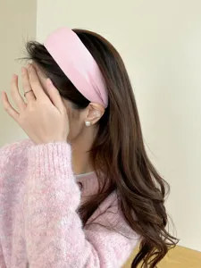 Elegant pink pleated knitted wide headband for women in soft Korean style fashion.