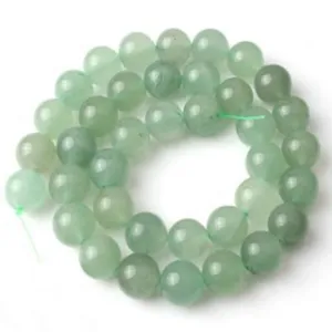 Perles en pierre verte en vrac pour fabrication de bijoux DIY, détail de brin de perles rondes.