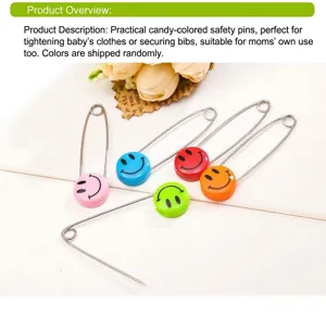 Colorful smiley baby safety pins for securing clothes and blankets safely and conveniently.