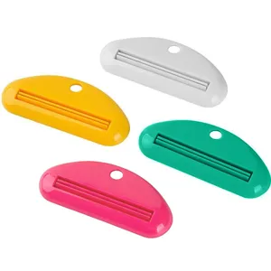 Dispensador de pasta de dientes de plástico multifuncional para limpiador facial tubos.