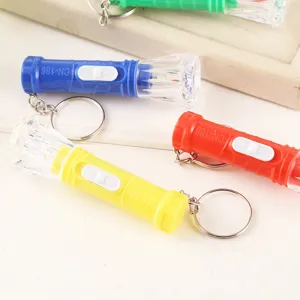 Portatile LED plastica torcia portachiavi mini torcia luminosa regalo gadget pratico