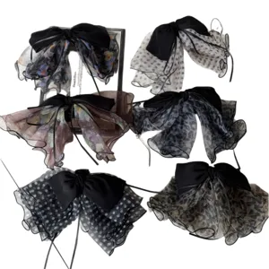 Set of French elegant mesh bow hair clips featuring polka dot and floral patterns