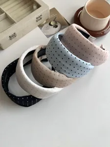 Collection of stylish polka dot wide headbands in various colors for high skull top hair styling