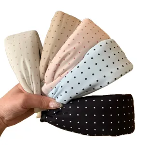 Assorted set of five stylish polka dot wide headbands in pastel colors and black