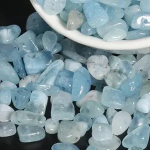 Close-up detail of light blue irregular crystal gemstone chips for DIY jewelry making.