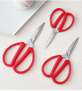 Stainless steel red handle household scissors detail view for daily craft and office use