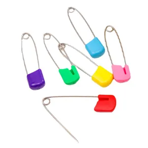 Colorful safety pins with plastic locking heads, ideal for baby clothing, crafts, and tagging use.