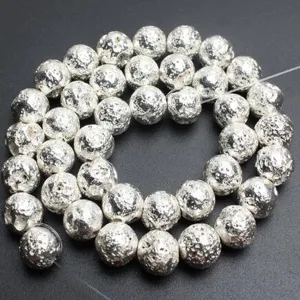 Silver electroplated lava stone round loose beads detail shot for DIY handmade jewelry crafting.