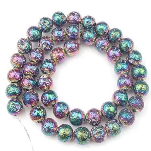 Detail view of colorful electroplated lava stone round loose beads for DIY jewelry making.