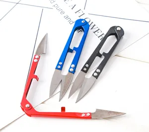 Portable U-shaped thread scissors for sewing, cross-stitch, and snipping yarn ends easily.