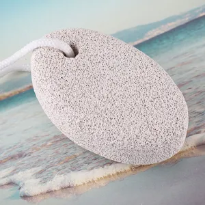 Oval volcanic pumice stone with hanging cord for foot callus and dead skin removal home use.