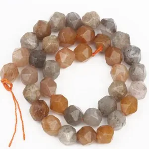 Faceted gemstone beads close up detail, natural stone round loose beads for DIY jewelry making.