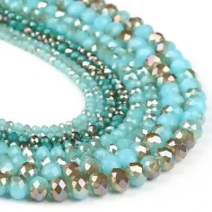 Close-up detail of multi-strand crystal loose beads with AB color for handmade jewelry.