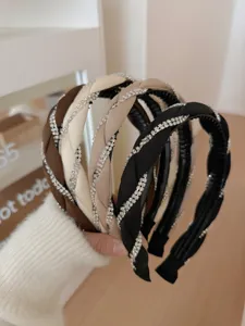 Macro detail of elegant vintage rhinestone woven headbands in various colors for women