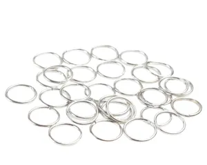 Silver jump rings for DIY jewelry making, metal split rings for crafting earrings.