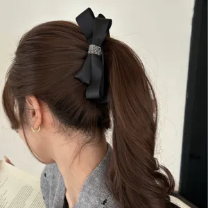 Elegant black silk bow banana clip with sparkling rhinestone buckle for woman ponytail