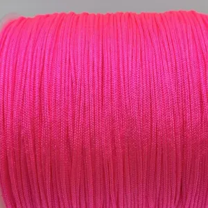 Detailed close-up view of bright pink nylon jade cord, ideal for DIY handmade bracelets and necklaces.