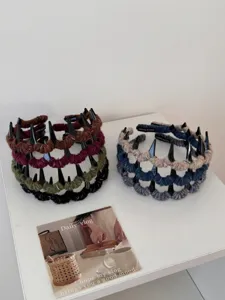 Detailed shot of retro wool-wrapped wave headbands with non-slip teeth in multiple colors