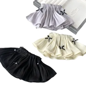 Set of three elegant pleated skirt style bow hair clips with pearls in three colors