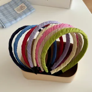 Set aus farbenfrohen, gedrehten, gefalteten Haarbändern in Unifarben für Damen