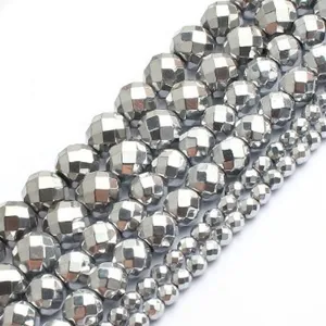 Faceted silver plated hematite round beads detail macro shot craft supplies diy parts