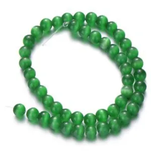 Green cat's eye gemstone loose round beads detail view for DIY bracelet jewelry making accessories.