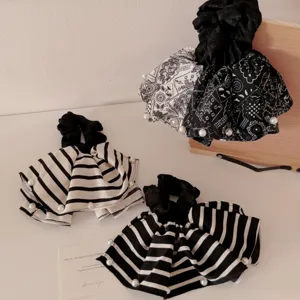 Vintage black and white paisley and striped fabric scrunchies with white pearl accents