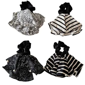 Retro black and white paisley and striped fabric scrunchies with faux pearl trim