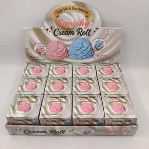 Macro view of a 12-pack display box featuring colorful slow rebound cream roll squishy toys.