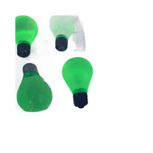 Creative green noctilucent light bulb squishy toy for stress relief and office fun.