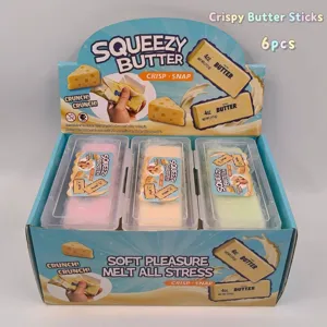Dettaglio della scatola espositiva con giocattoli Squeezy Butter a rimbalzo lento