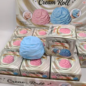 Detailed macro view of a light blue cream roll squishy toy with its display packaging