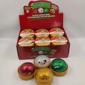Coffret de jouets squishy dumplings de Noël pailletés dans une boîte rouge