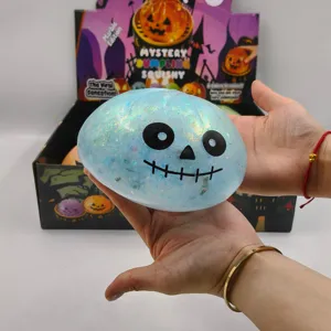 Detailed view of 15cm glittery blue Halloween pumpkin squishy toy for stress relief