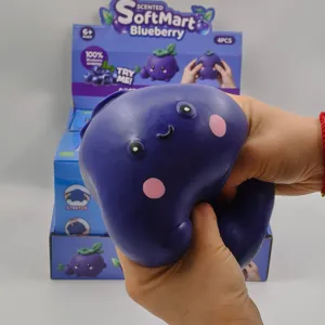 Large scented blueberry stress relief squishy toy being squeezed to show slow rebound texture