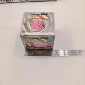 Detailed view of cream roll squishy toy box with ruler showing 6cm width for size