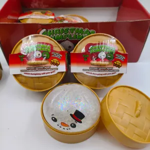 Jouet squishy de boulette de Noël scintillant dans son récipient style panier