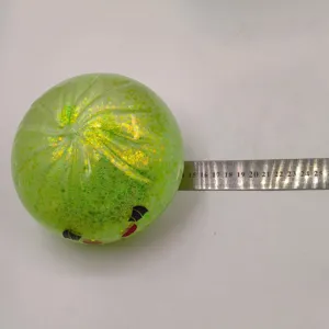 Grand jouet anti-stress en forme de brioche pailletée verte de 15 cm avec une règle de mesure