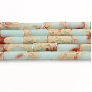 Detailed view of 4x13mm cylindrical imperial jasper gemstone loose beads for DIY bracelet making.
