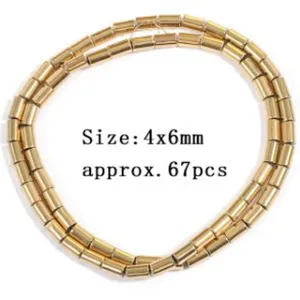 Detail view of golden cylindrical loose beads, 4x6mm size, ideal for DIY jewelry making.